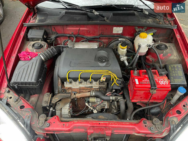 Красный Дэу Ланос, объемом двигателя 1.4 л и пробегом 201 тыс. км за 3200 $, фото 3 на Automoto.ua
