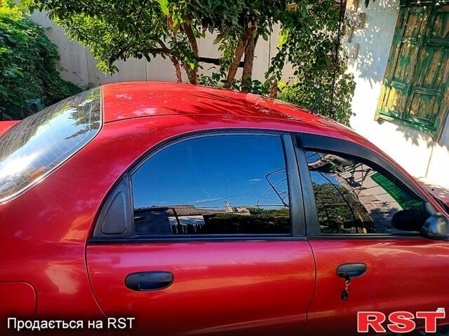 Червоний Деу Ланос, об'ємом двигуна 1.5 л та пробігом 112 тис. км за 1900 $, фото 9 на Automoto.ua