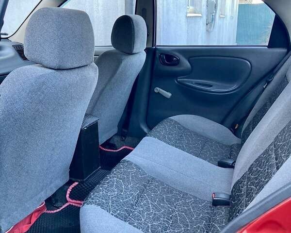 Красный Дэу Ланос, объемом двигателя 1.4 л и пробегом 103 тыс. км за 2700 $, фото 7 на Automoto.ua