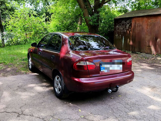 Красный Дэу Ланос, объемом двигателя 1.5 л и пробегом 213 тыс. км за 3000 $, фото 1 на Automoto.ua