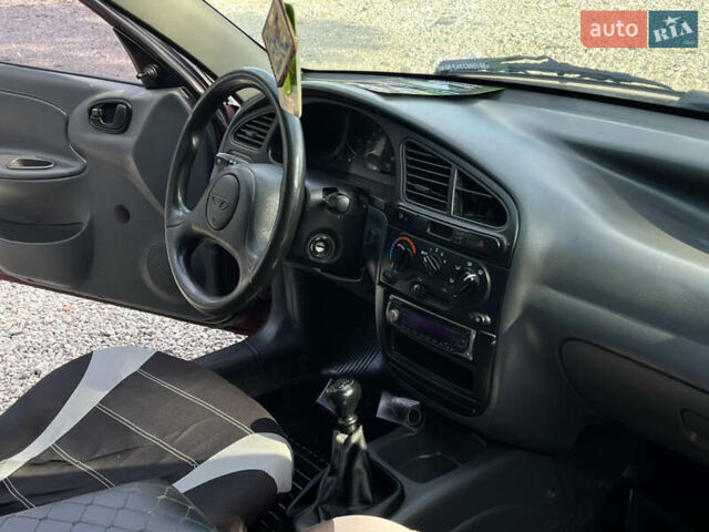 Красный Дэу Ланос, объемом двигателя 1.5 л и пробегом 263 тыс. км за 2600 $, фото 19 на Automoto.ua