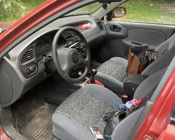 Красный Дэу Ланос, объемом двигателя 1.5 л и пробегом 212 тыс. км за 2250 $, фото 4 на Automoto.ua