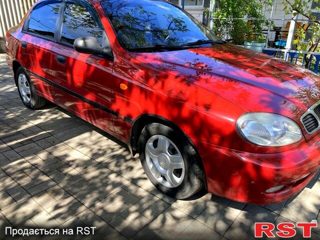 Красный Дэу Ланос, объемом двигателя 1.6 л и пробегом 155 тыс. км за 4000 $, фото 1 на Automoto.ua