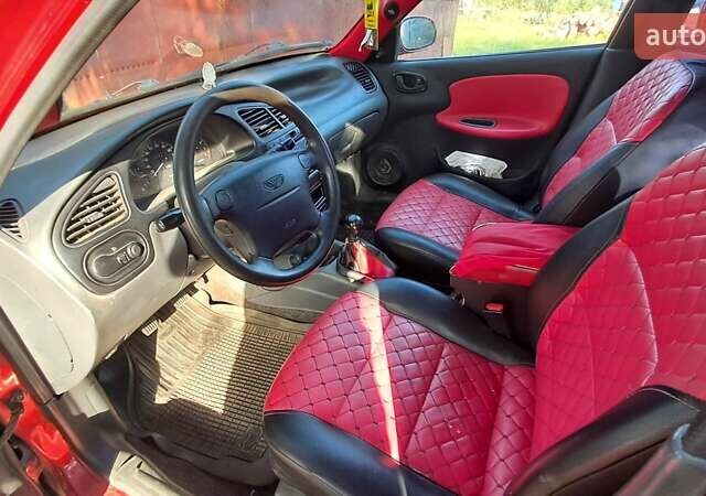 Деу Ланос 2008 у Житомирі на Automoto.ua Червоний Деу Ланос, об'ємом двигуна 1.6 л та пробігом 305 тис. км за 2000 $, фото 2 на Automoto.ua