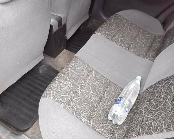 Красный Дэу Ланос, объемом двигателя 1.5 л и пробегом 210 тыс. км за 1800 $, фото 4 на Automoto.ua