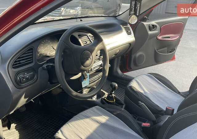 Красный Дэу Ланос, объемом двигателя 1.5 л и пробегом 148 тыс. км за 2600 $, фото 35 на Automoto.ua