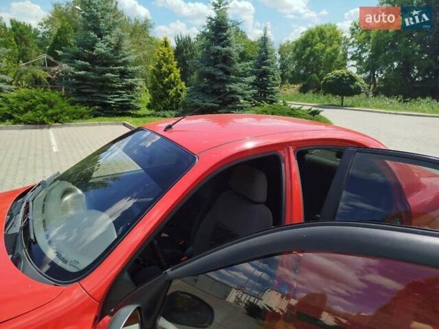 Червоний Деу Ланос, об'ємом двигуна 1.5 л та пробігом 58 тис. км за 4000 $, фото 16 на Automoto.ua