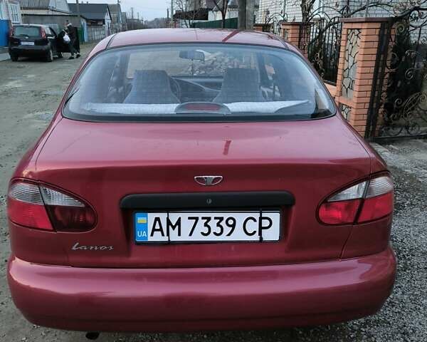Красный Дэу Ланос, объемом двигателя 1.5 л и пробегом 230 тыс. км за 2350 $, фото 4 на Automoto.ua