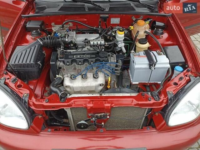 Красный Дэу Ланос, объемом двигателя 15 л и пробегом 170 тыс. км за 2750 $, фото 15 на Automoto.ua