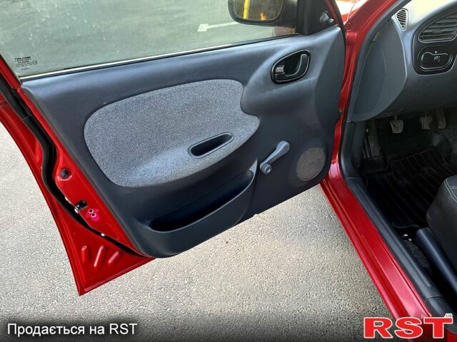 Красный Дэу Ланос, объемом двигателя 1.4 л и пробегом 150 тыс. км за 2700 $, фото 4 на Automoto.ua