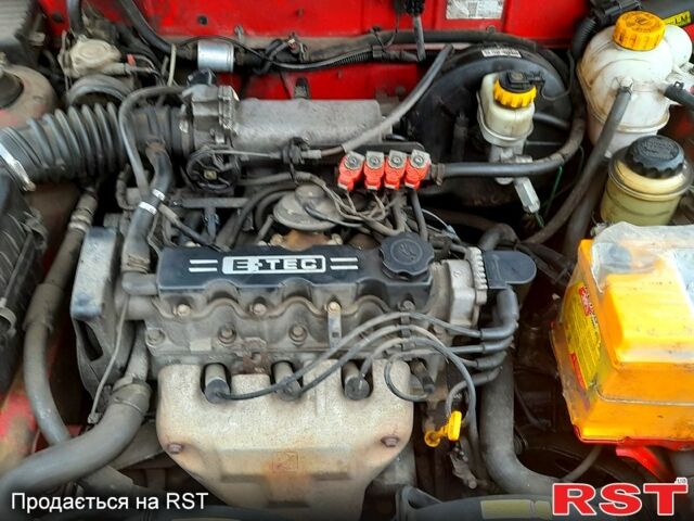 Красный Дэу Ланос, объемом двигателя 1.5 л и пробегом 181 тыс. км за 1999 $, фото 10 на Automoto.ua