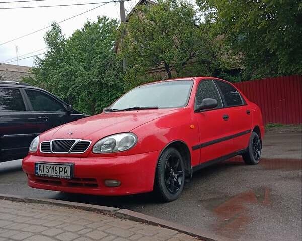 Красный Дэу Ланос, объемом двигателя 1.5 л и пробегом 250 тыс. км за 1700 $, фото 11 на Automoto.ua