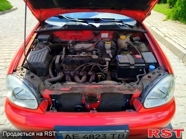 Красный Дэу Ланос, объемом двигателя 1.5 л и пробегом 158 тыс. км за 3500 $, фото 5 на Automoto.ua