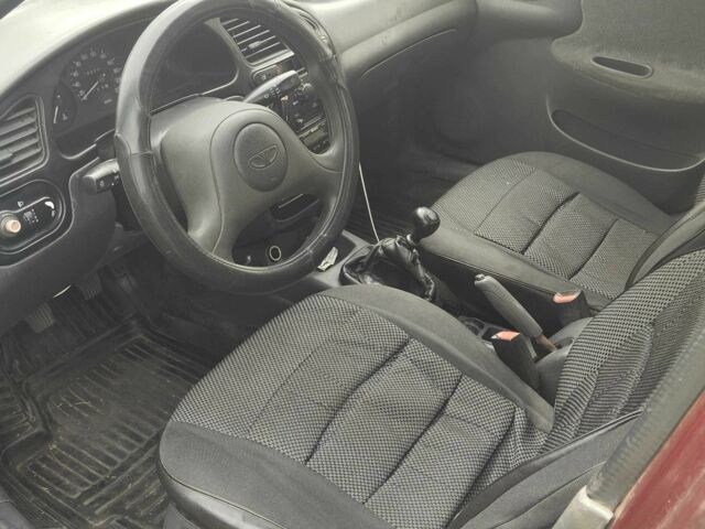 Красный Дэу Ланос, объемом двигателя 1.5 л и пробегом 175 тыс. км за 1850 $, фото 3 на Automoto.ua