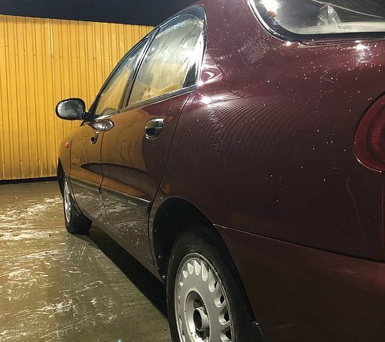 Красный Дэу Ланос, объемом двигателя 1.6 л и пробегом 161 тыс. км за 2200 $, фото 8 на Automoto.ua