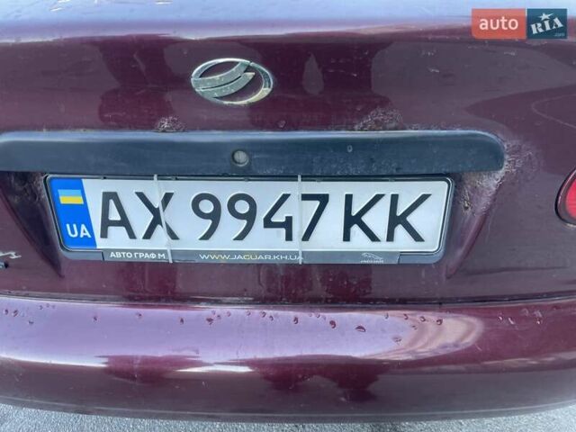Красный Дэу Ланос, объемом двигателя 1.6 л и пробегом 227 тыс. км за 2800 $, фото 6 на Automoto.ua