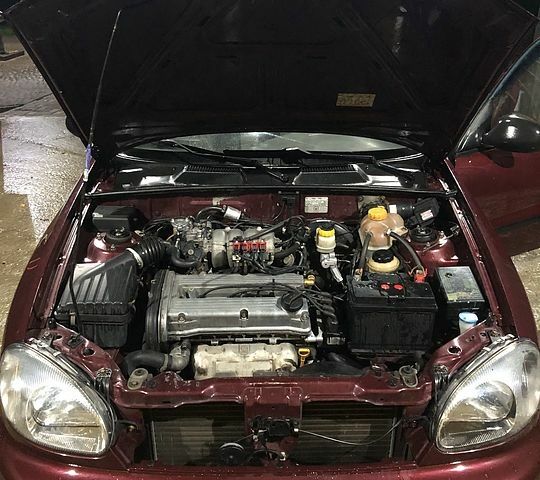 Красный Дэу Ланос, объемом двигателя 1.6 л и пробегом 161 тыс. км за 2200 $, фото 10 на Automoto.ua