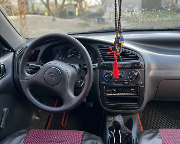 Красный Дэу Ланос, объемом двигателя 1.6 л и пробегом 179 тыс. км за 2099 $, фото 7 на Automoto.ua