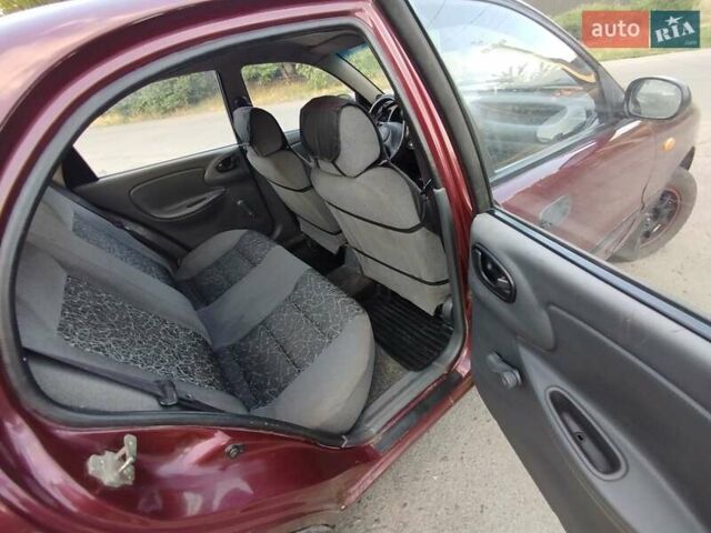 Червоний Деу Ланос, об'ємом двигуна 1.5 л та пробігом 187 тис. км за 2500 $, фото 27 на Automoto.ua