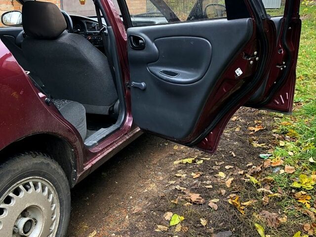 Красный Дэу Ланос, объемом двигателя 1.6 л и пробегом 161 тыс. км за 2200 $, фото 6 на Automoto.ua