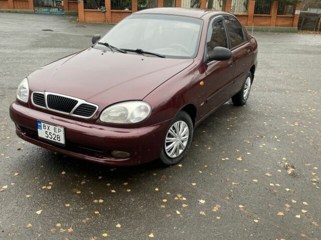 Красный Дэу Ланос, объемом двигателя 1.5 л и пробегом 297 тыс. км за 1900 $, фото 1 на Automoto.ua