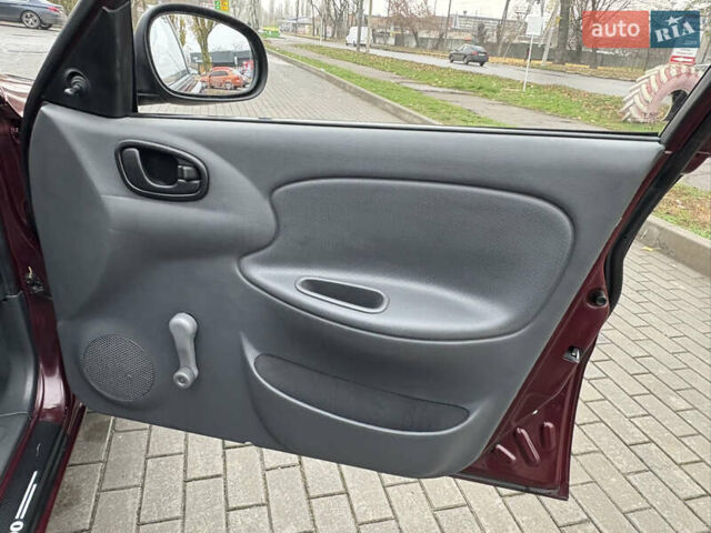 Красный Дэу Ланос, объемом двигателя 1.5 л и пробегом 74 тыс. км за 3400 $, фото 20 на Automoto.ua