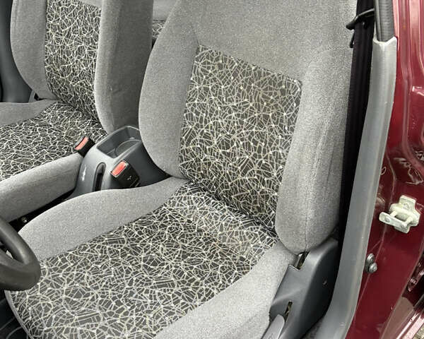 Красный Дэу Ланос, объемом двигателя 1.5 л и пробегом 74 тыс. км за 3400 $, фото 12 на Automoto.ua