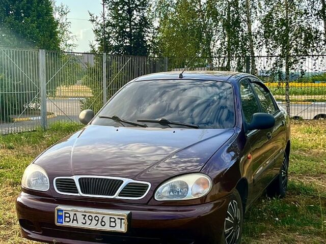 Красный Дэу Ланос, объемом двигателя 1.4 л и пробегом 190 тыс. км за 2300 $, фото 2 на Automoto.ua