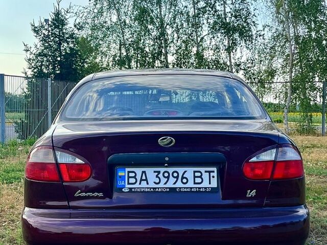 Красный Дэу Ланос, объемом двигателя 1.4 л и пробегом 190 тыс. км за 2300 $, фото 4 на Automoto.ua