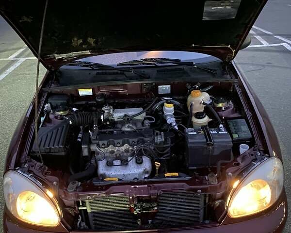 Красный Дэу Ланос, объемом двигателя 1.5 л и пробегом 150 тыс. км за 2500 $, фото 6 на Automoto.ua