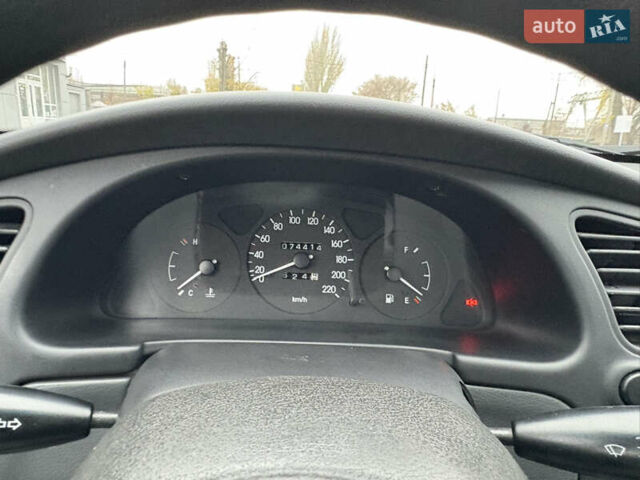 Красный Дэу Ланос, объемом двигателя 1.5 л и пробегом 74 тыс. км за 3400 $, фото 18 на Automoto.ua