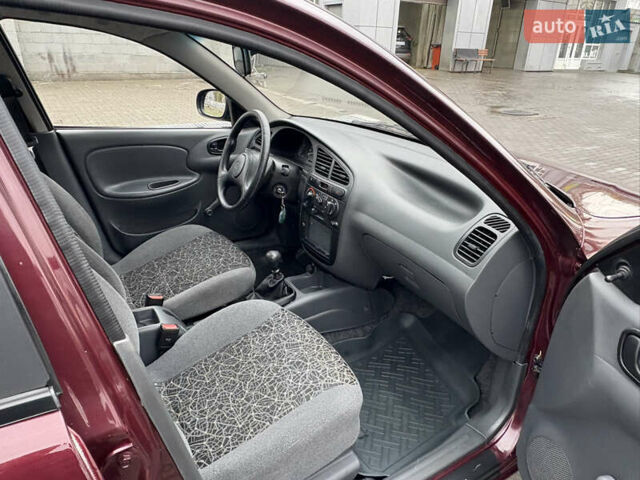 Красный Дэу Ланос, объемом двигателя 1.5 л и пробегом 74 тыс. км за 3400 $, фото 19 на Automoto.ua