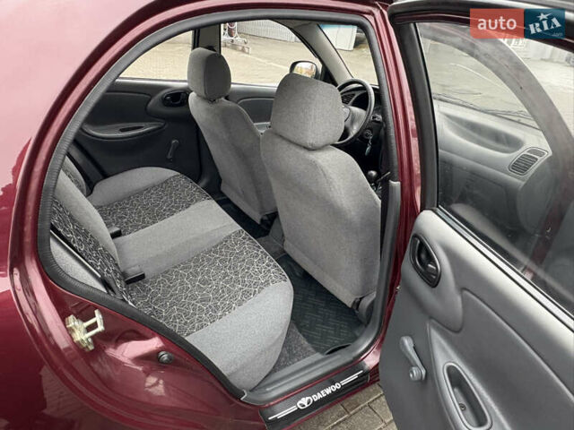 Красный Дэу Ланос, объемом двигателя 1.5 л и пробегом 74 тыс. км за 3400 $, фото 21 на Automoto.ua
