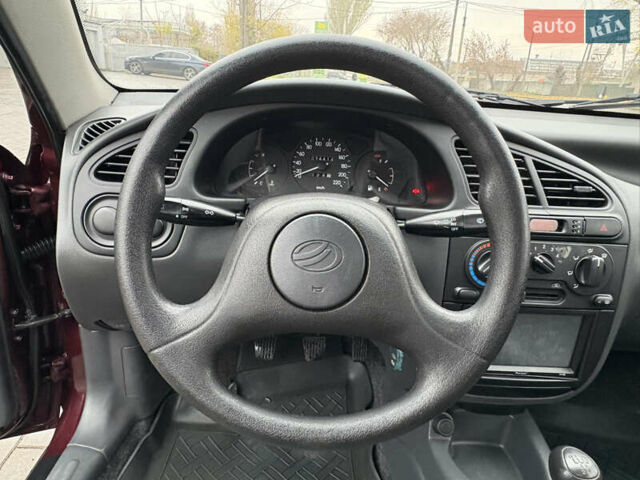 Красный Дэу Ланос, объемом двигателя 1.5 л и пробегом 74 тыс. км за 3400 $, фото 16 на Automoto.ua