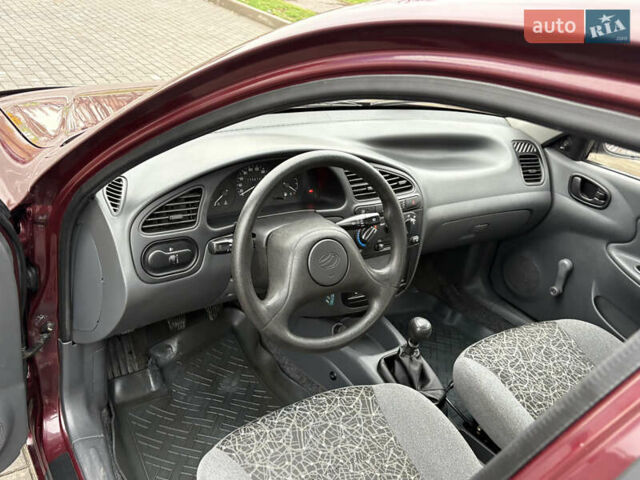 Красный Дэу Ланос, объемом двигателя 1.5 л и пробегом 74 тыс. км за 3400 $, фото 10 на Automoto.ua