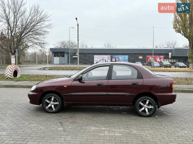 Красный Дэу Ланос, объемом двигателя 1.5 л и пробегом 74 тыс. км за 3400 $, фото 8 на Automoto.ua
