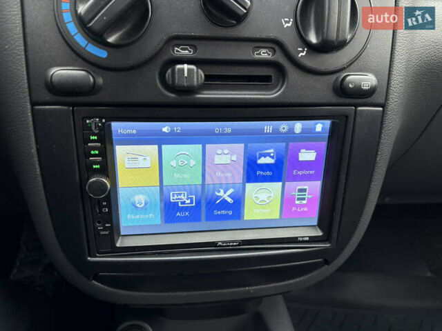 Красный Дэу Ланос, объемом двигателя 1.5 л и пробегом 74 тыс. км за 3400 $, фото 22 на Automoto.ua