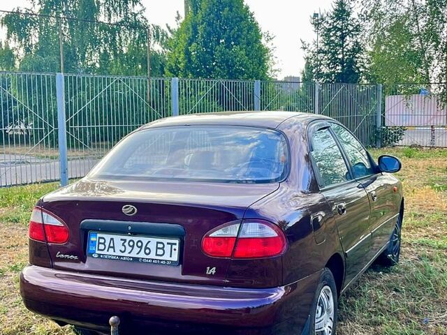 Красный Дэу Ланос, объемом двигателя 1.4 л и пробегом 190 тыс. км за 2300 $, фото 3 на Automoto.ua