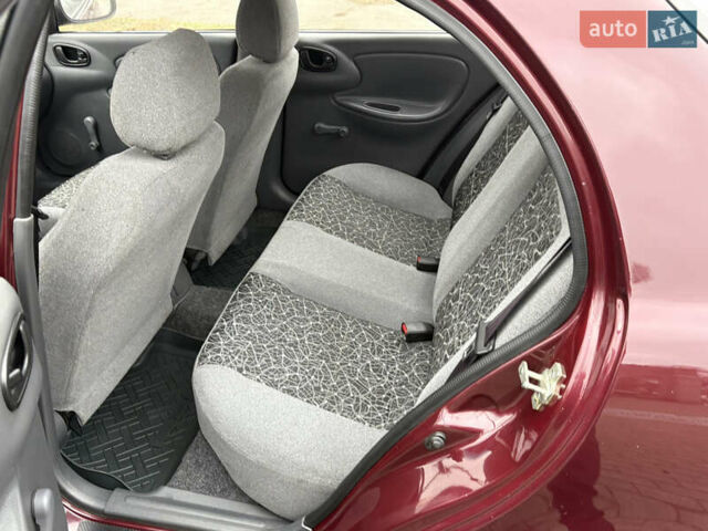 Красный Дэу Ланос, объемом двигателя 1.5 л и пробегом 74 тыс. км за 3400 $, фото 13 на Automoto.ua