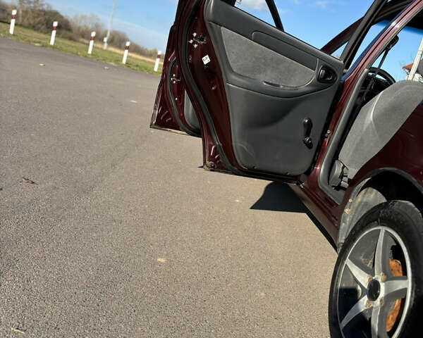 Красный Дэу Ланос, объемом двигателя 1.5 л и пробегом 134 тыс. км за 2650 $, фото 16 на Automoto.ua