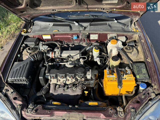 Красный Дэу Ланос, объемом двигателя 1.5 л и пробегом 134 тыс. км за 2650 $, фото 20 на Automoto.ua