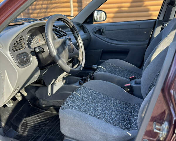 Красный Дэу Ланос, объемом двигателя 1.5 л и пробегом 134 тыс. км за 2650 $, фото 10 на Automoto.ua