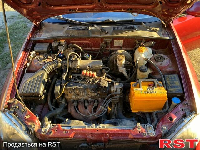 Красный Дэу Ланос, объемом двигателя 1.5 л и пробегом 160 тыс. км за 1500 $, фото 8 на Automoto.ua