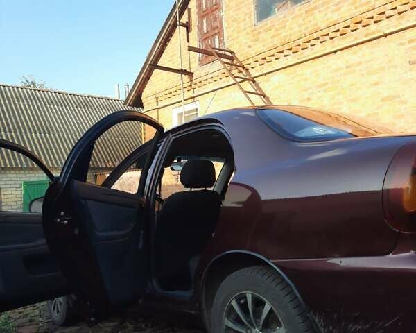 Красный Дэу Ланос, объемом двигателя 1.5 л и пробегом 168 тыс. км за 3000 $, фото 5 на Automoto.ua