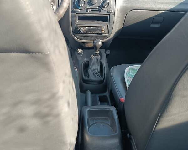 Дэу Ланос, объемом двигателя 1.5 л и пробегом 210 тыс. км за 1399 $, фото 9 на Automoto.ua