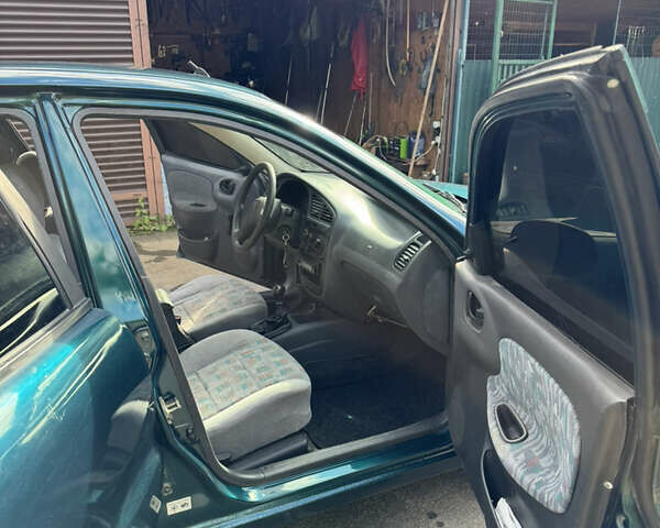 Дэу Ланос, объемом двигателя 1.5 л и пробегом 280 тыс. км за 1750 $, фото 6 на Automoto.ua