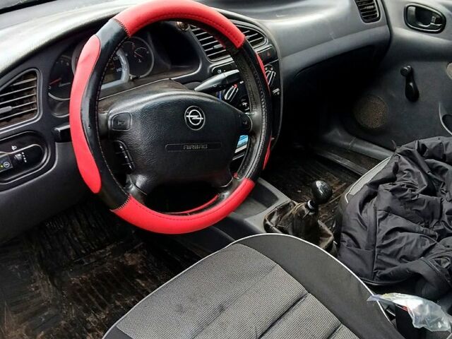 Дэу Ланос, объемом двигателя 1.3 л и пробегом 300 тыс. км за 1777 $, фото 5 на Automoto.ua