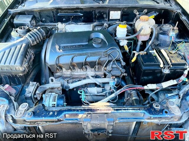 Дэу Ланос, объемом двигателя 1.3 л и пробегом 180 тыс. км за 1400 $, фото 8 на Automoto.ua