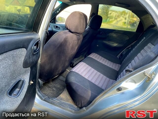 Дэу Ланос, объемом двигателя 16 л и пробегом 200 тыс. км за 1000 $, фото 12 на Automoto.ua