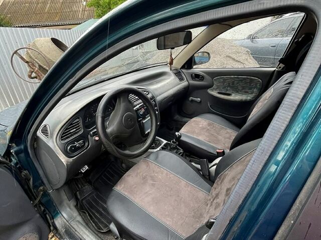 Дэу Ланос, объемом двигателя 1.4 л и пробегом 303 тыс. км за 1300 $, фото 3 на Automoto.ua